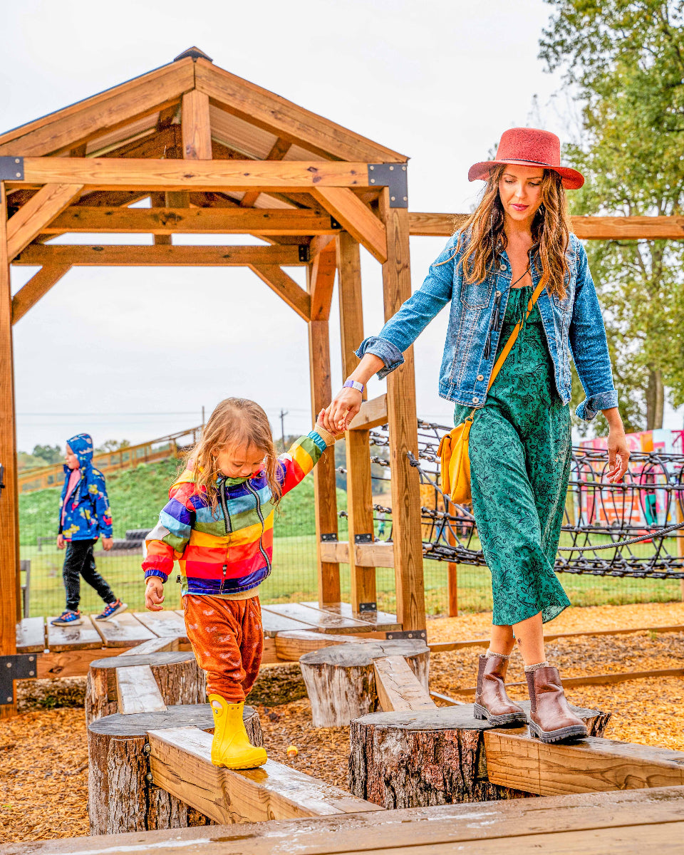a mom and daughter on the obstacle course